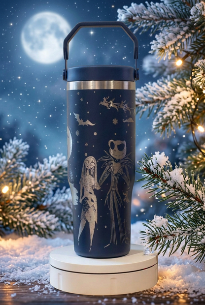 Navy 30oz thermal tumbler with silver-toned Night Before Christmas engraving and colour-matched carry-handle lid, on a moonlit festive background