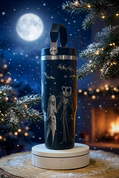 Black 30oz thermal tumbler with silver-toned Night Before Christmas engraving of Jack and Sally holding hands, on a moonlit festive background